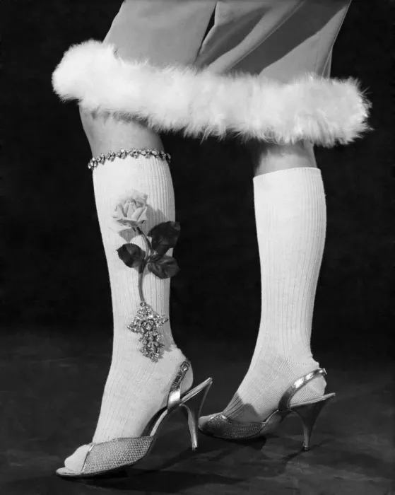Framed Print : Clothing stockings. Fur-trimmed skirt, knee length socks with a rose flower design