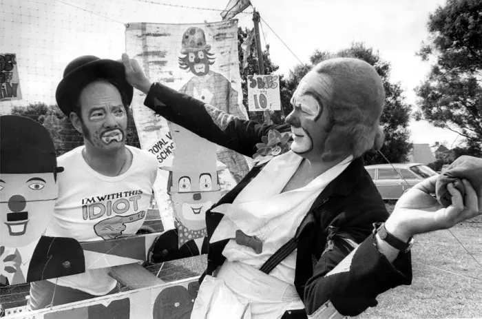 Framed Print : Clown brothers Geoff and Don Atha fooling around on a knock em off'stall Framed Print : Clown brothers Geoff and Don Atha fooling around on a knock em off'stall