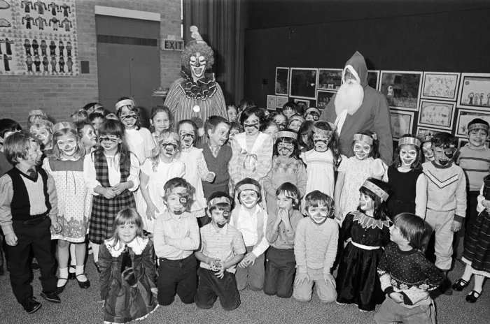 Framed Print : A clown and Father Christmas visiting Kemplah Primary School, Guisborough. December 1985 Framed Print : A clown and Father Christmas visiting Kemplah Primary School, Guisborough. December 1985