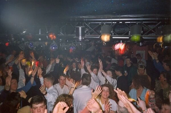 Clubbers get hot and sweaty enjoying a rave