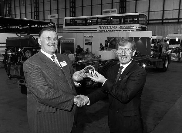 Coach company operator Harry Shaw (left) received the 15