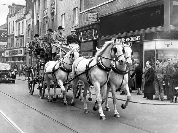 A coach and horses on the streets of Sunderland. The stagecoach is drawn by four greys