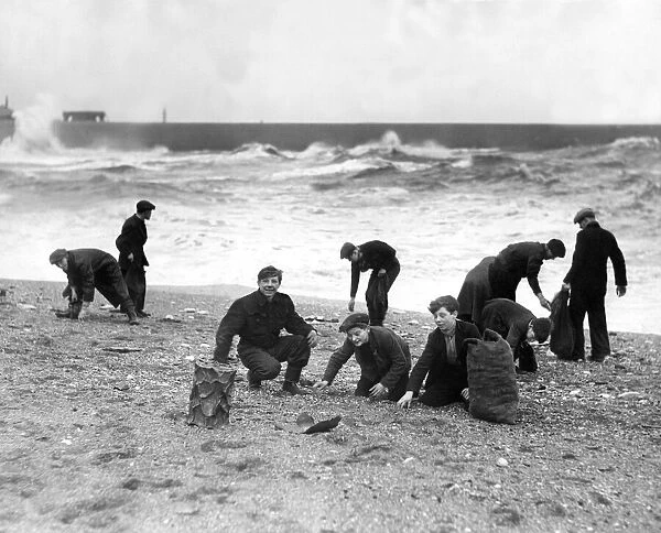 Coal gatherers on the beach at Hendon, Sunderland run for it as the big breakers roll up