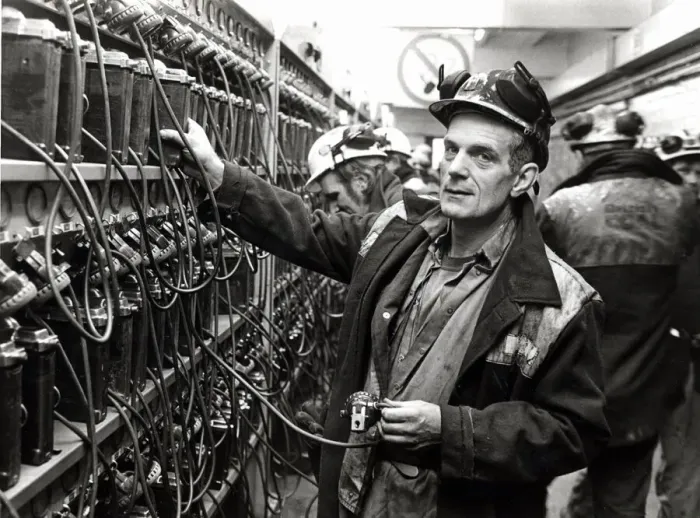 Framed Print : Coal - Miners - Coal miner checks his lamp in at the lamp room at a South Wales Colliery Framed Print : Coal - Miners - Coal miner checks his lamp in at the lamp room at a South Wales Colliery