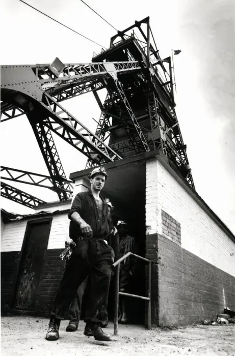 Framed Print : Coal - Miners - General mining shot showing a miner with the winding gear in Framed Print : Coal - Miners - General mining shot showing a miner with the winding gear in
