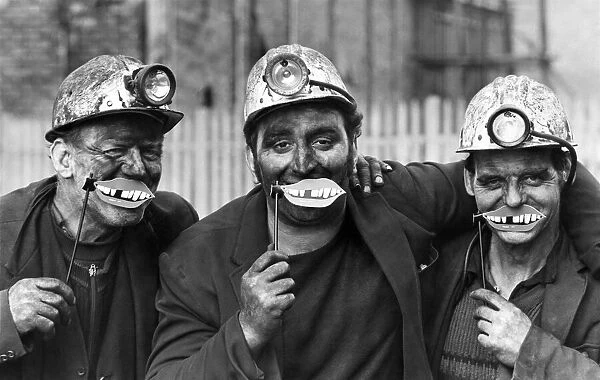 Coal Miners: Three miners come up with a smile left to right, Fred Robson