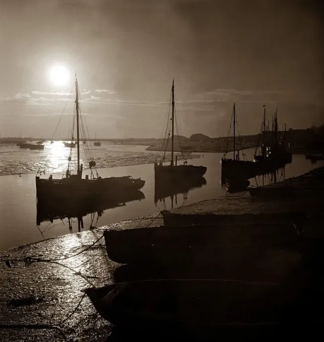 Framed Print : Cockling boats tied up on a river estuary in England circa 1950s Framed Print : Cockling boats tied up on a river estuary in England circa 1950s
