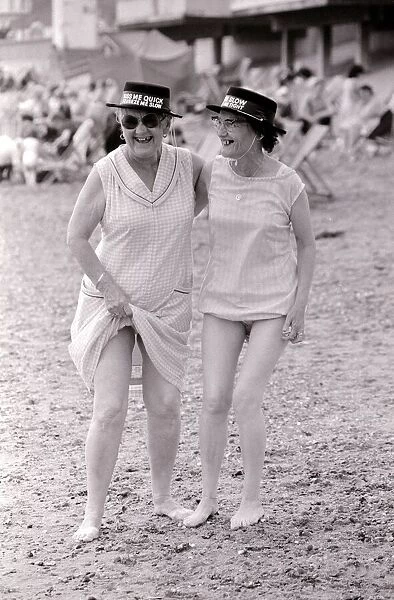 Cockney sisters May Pirie 56 and Lillian Hernandez 68 enjoy a day out at the seaside