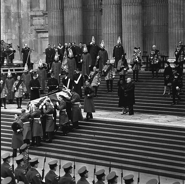 The coffin with body of Sir Winston Churchill Jan 1965 is carried down the steps of