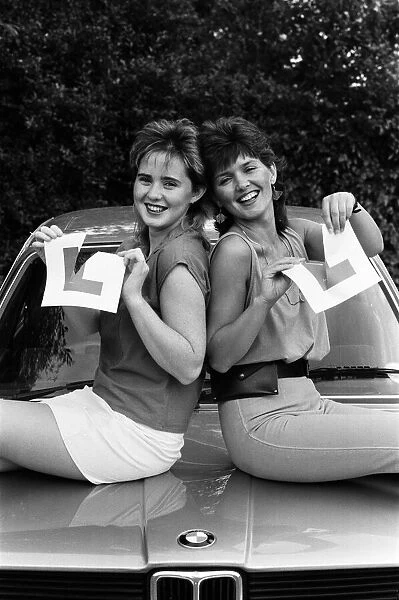 Coleen Nolan (19), left, and her sister Maureen (30) both passed their driving test with