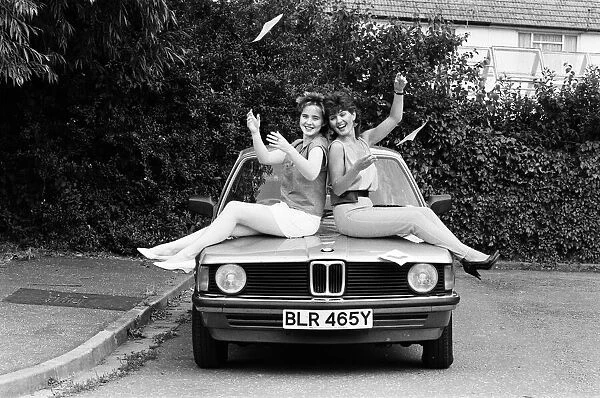 Coleen Nolan (19), right, and her sister Maureen (30) both passed their driving test with