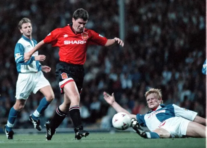 Framed Print : Colin Hendry tackle moments before dive by Roy Keane Manchester United Player who was