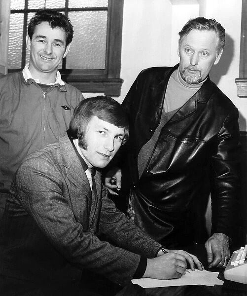 Colin Todd signs for Derby County February 1971 watched by manager Brian Clough