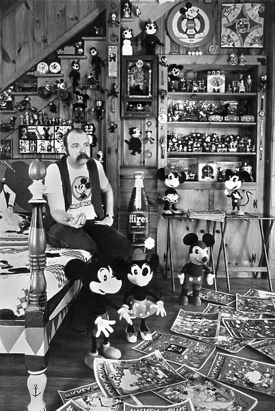Collections. Mickey Mouse mania. Assistant Professor John Fawcett at his home