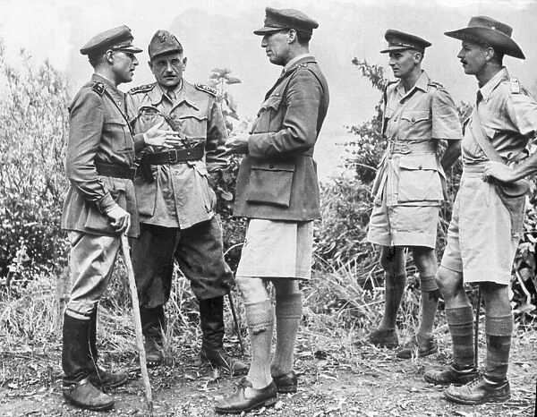 Colonel Gonella, head of the Italian force, talking with the British brigadier who