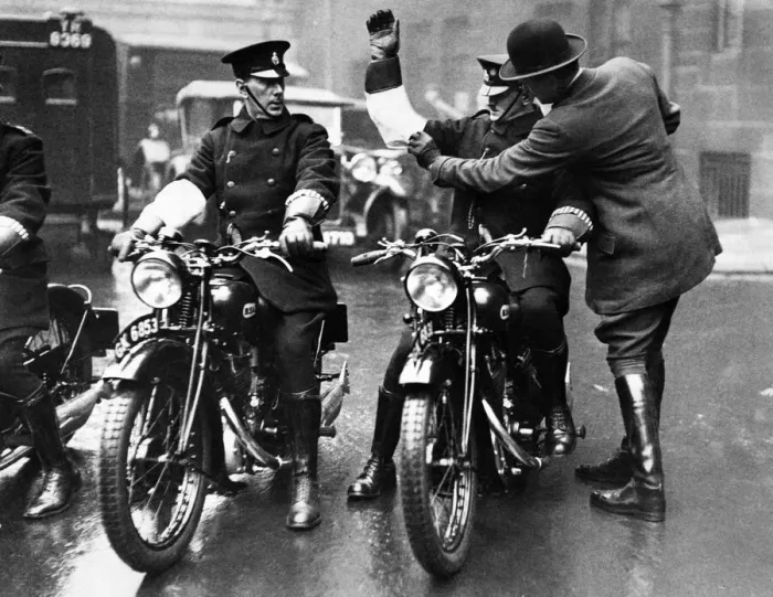 Framed Print : Colonel Laurie adjusting the white armlet of one of the 500 Metropolitan policemen who Framed Print : Colonel Laurie adjusting the white armlet of one of the 500 Metropolitan policemen who