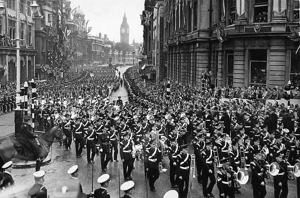 The Colonial Contingents of the armed service march along Whitehall following