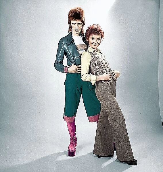 This is the coloured up version of image IN*1940311. Pop star David Bowie with Lulu