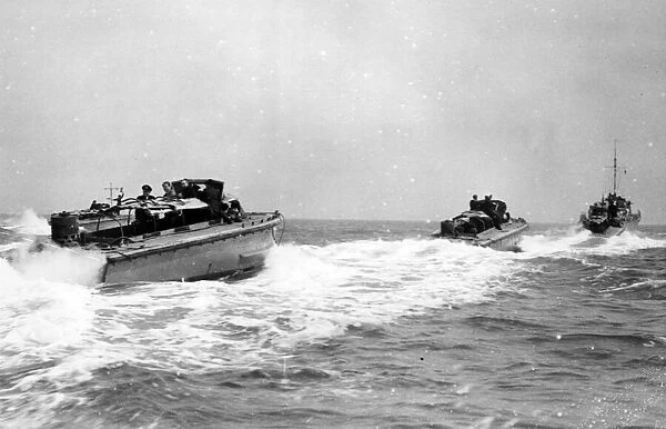 Combined operations exercises. Section of a landing craft flotilla setting off during