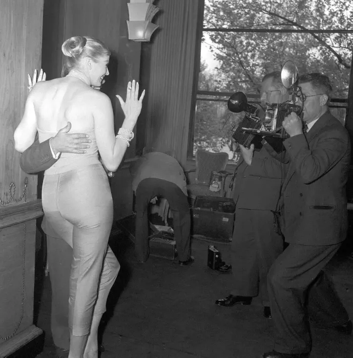 Framed Print : Comedian and actor Norman Wisdom poses for photographers with actress Anita Ekberg