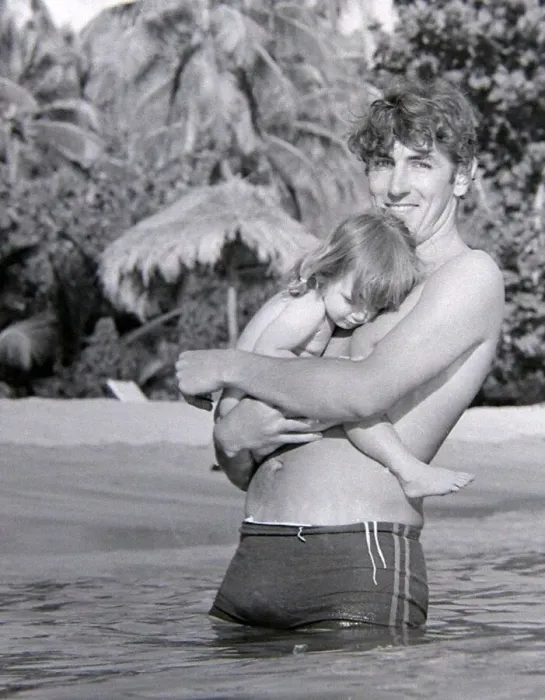 Framed Print : Comedian, actor and publisher Peter Cook with his daughter Lucy during a holiday in
