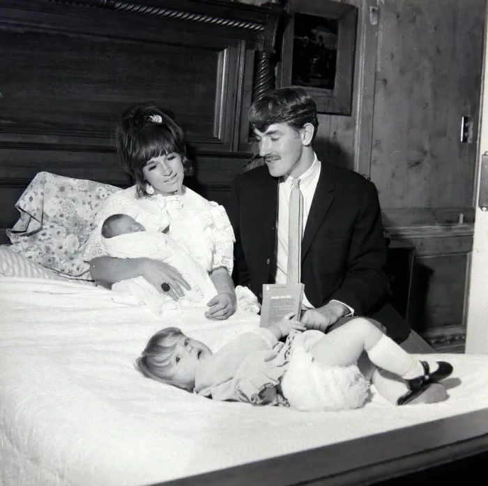 Framed Print : Comedian, actor and publisher Peter Cook with his wife Wendy daughter Lucy