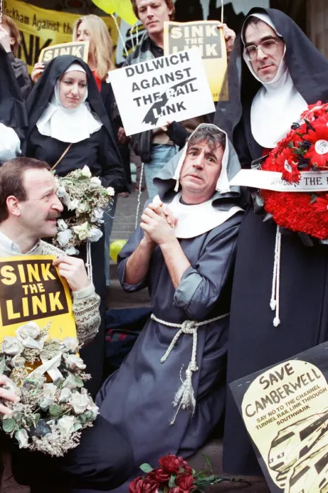 Framed Print : Comedian and actor Terry Jones takes part in a rail tunnel protest outside Waterloo Framed Print : Comedian and actor Terry Jones takes part in a rail tunnel protest outside Waterloo