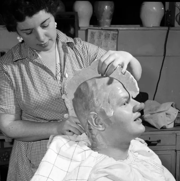 Framed Print : Comedian Benny Hill having a plaster cast of his skull made Framed Print : Comedian Benny Hill having a plaster cast of his skull made