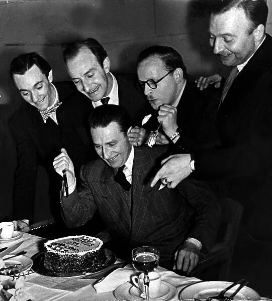 Comedian Charlie Chester cutting a birthday cake February 1947 ecard03