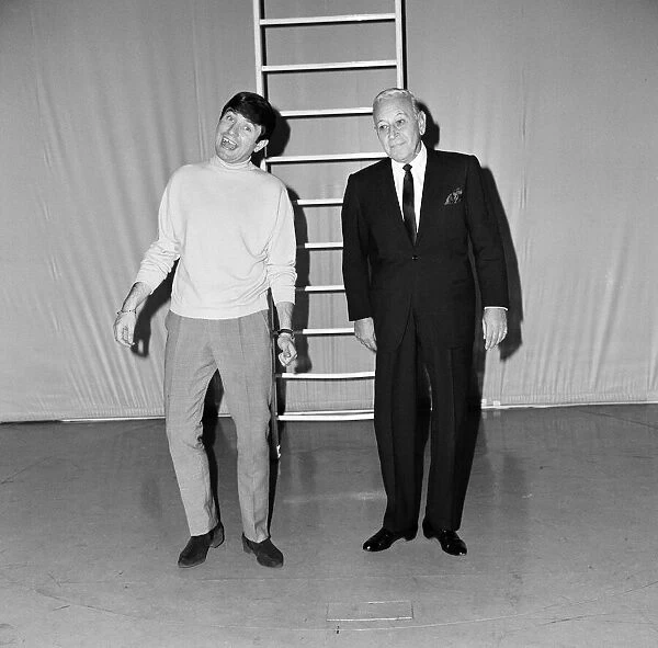 Comedian Jimmy Tarbuck with George Raft at the Palladium. 31st October 1965