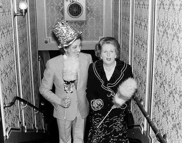 Comedian Ken Dodd clowning with a surprise member of the audience, Margaret Thatcher