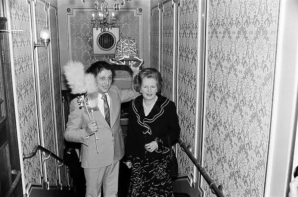 Comedian Ken Dodd clowning with a surprise member of the audience, Margaret Thatcher