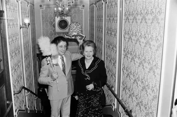 Framed Print : Comedian Ken Dodd clowning with a surprise member of the audience, Margaret Thatcher