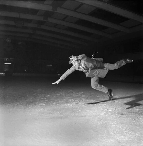 Comedian Norman Wisdom on ice. October 1953 D6365-004