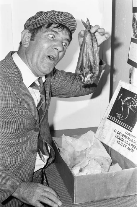 Framed Print : Comedian Norman Wisdom seen here in the persona of hapless on screen character Norman