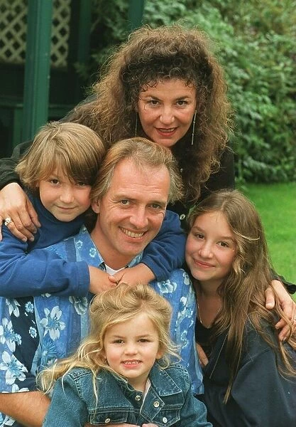 Comedian Rik Mayall with his family, wife Barbara and three children, Rosie