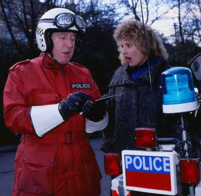 Framed Print : Comedian Rikki Fulton booking Barbara Dickson in the television programme Supercop Framed Print : Comedian Rikki Fulton booking Barbara Dickson in the television programme Supercop