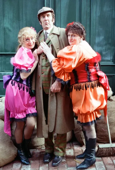 Framed Print : Comedian Russ Abbott dressed as Sherlock Holmes flanked by Sherrie Hewson (left Framed Print : Comedian Russ Abbott dressed as Sherlock Holmes flanked by Sherrie Hewson (left