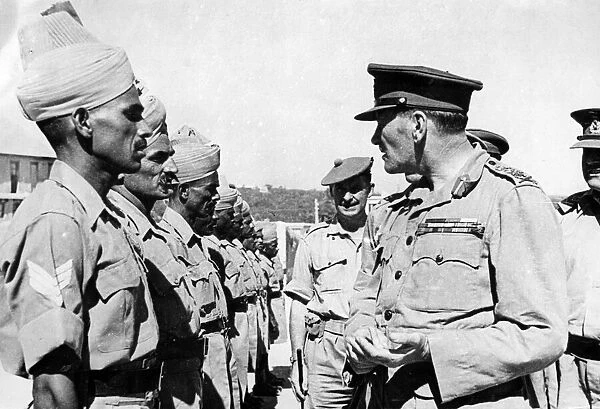 The Commander-in-Chief, General Sir Claude Auchinleck inspects Indian troops in Syria