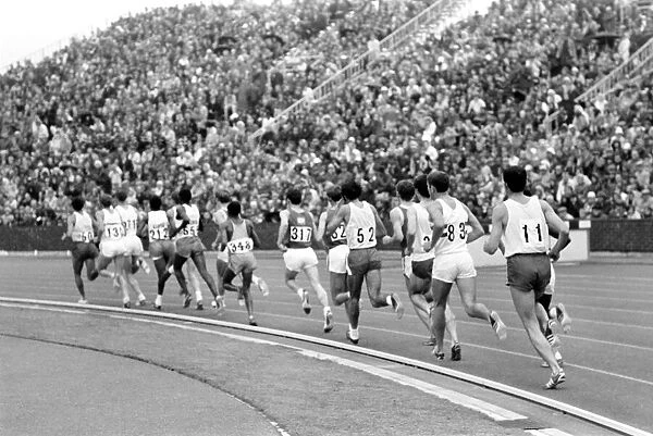 Commonwealth Games, Edinburgh: Athletics. Taylor (130) leads from Clarke