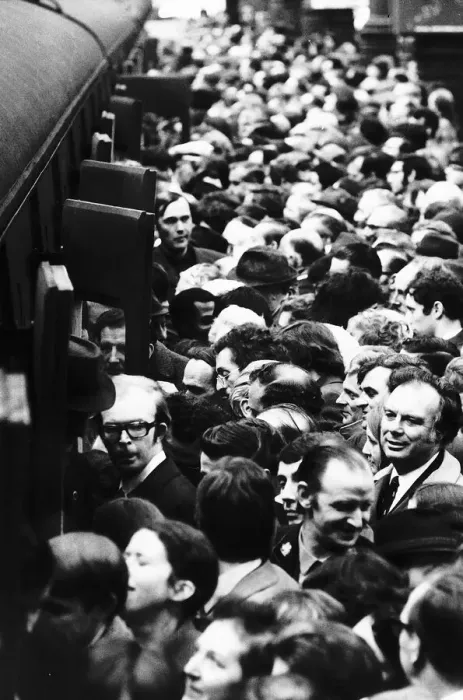 Framed Print : Commuters on a crowded London main line staion try to board a train Framed Print : Commuters on a crowded London main line staion try to board a train