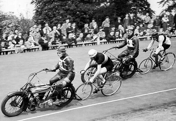Competitors in a motor-paced cycle race at Herne Hill Velodrome, our picture shows