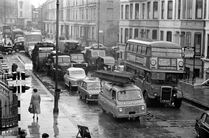 Framed Print : Congestion around a wet Earls Court in London where the 1959 Motor Show is taking place Framed Print : Congestion around a wet Earls Court in London where the 1959 Motor Show is taking place