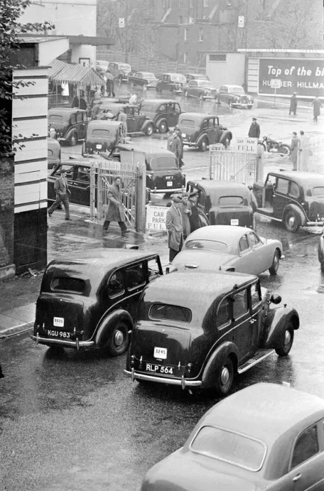 Framed Print : Congestion around a wet Earls Court in London where the 1959 Motor Show is taking place Framed Print : Congestion around a wet Earls Court in London where the 1959 Motor Show is taking place