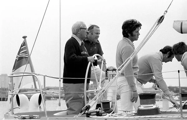 Former Conservative Party leader Ted Heath at the helm of Morning Cloud yacht. May 1975