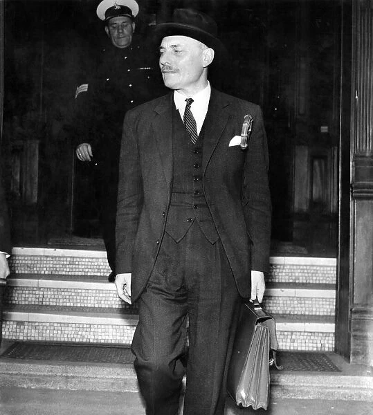 Conservative party politician Enoch Powell leaves the Exchange Hotel