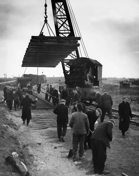 Framed Print : Construction crew seen here working against the clock to complete the laying of a new