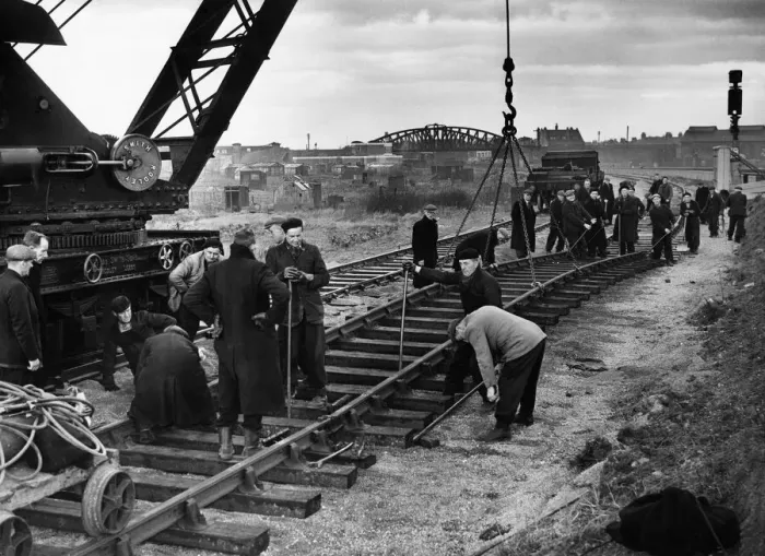 Framed Print : Construction crew seen here working against the clock to complete the laying of a new