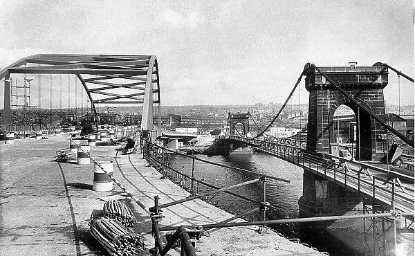 Construction of the new Scotswood bridge next to the old one. c. 1965