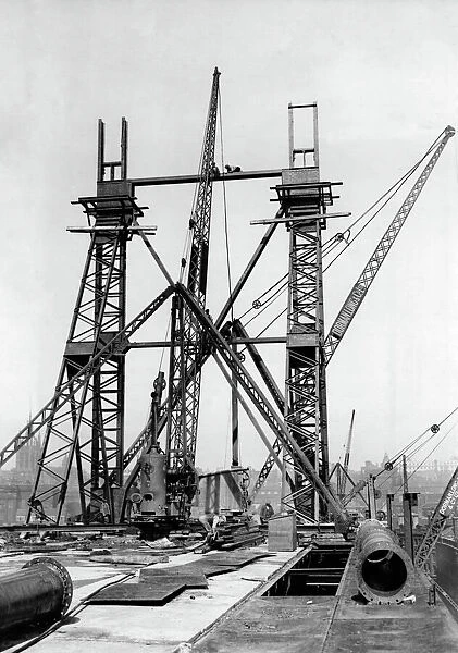 Construction of the new Tyne Bridge. The Gateshead erection masts